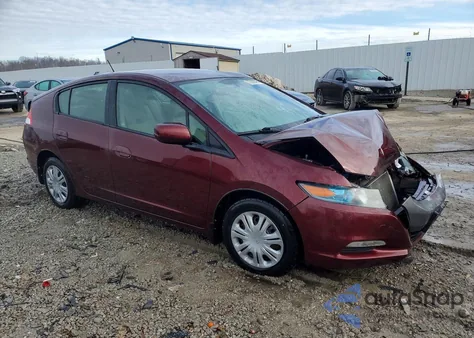 2011 Honda Insight z USA, uszkodzony, nr VIN JHMZE2H30BS012352